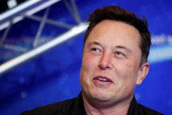 Tesla and SpaceX CEO Elon Musk arrives on the red carpet for the Axel Springer media award in Berlin on Dec. 1, 2020. A federal judge in California has dismissed a securities fraud and defamation lawsuit on Thursday, May 19, 2022, that a Tesla investor had filed against CEO Elon Musk, the company and a supporter of Musk.