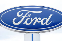 A Ford logo is seen on signage at Country Ford in Graham, N.C., Tuesday, July 27, 2021. Ford is issuing two recalls covering over 737,000 vehicles, Friday, April 1, 2022, to fix oil leaks and trailer braking systems that won't work. Ford says in government documents posted Thursday, May 19, 2022, is asking the owners of 350,000 vehicles in to take them to dealers for repairs in three recalls, including about 39,000 that should be parked outdoors because the engines can catch fire.