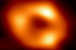 This image released by the Event Horizon Telescope Collaboration, Thursday, May 12, 2022, shows a black hole at the center of our Milky Way galaxy. The Milky Way black hole is called Sagittarius A*, near the border of Sagittarius and Scorpius constellations. It is 4 million times more massive than our sun. The image was made by eight synchronized radio telescopes around the world.