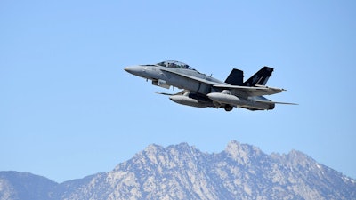 The U.S. Marine Corps pilot demonstrated the radar’s integration with the legacy Hornet avionics.