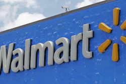 A Walmart sign displayed on the facade of a store in Hialeah Gardens, Fla., on June 1, 2017. Walmart is adding four new fulfillment centers to its existing capacity, a move that will bring more than 4,000 jobs and make next- or two-day shipping available to more Americans.