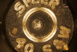 A bullet casing showing identification codes, at center, is shown through a microscope at a news conference at the Los Angeles Police Academy, Aug. 14, 2007. New York Gov. Kathy Hochul signed 10 public safety-related bills, Monday, June 7, 2022, including one that will require microstamping in new firearms, which could help law enforcement solve gun-related crimes.