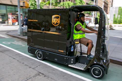 UPS worker Dyghton Anderson peddles an eQuad electric bike in a bicycle lane while delivering packages, in New York, Tuesday, June 14, 2022. Delivery giant UPS is going back to the future in its latest way to get packages to the doors of its millions of customers. The company is considering launching a fleet of pedal- and battery-powered cargo cycles for deliveries in some of the country's most congested cities.