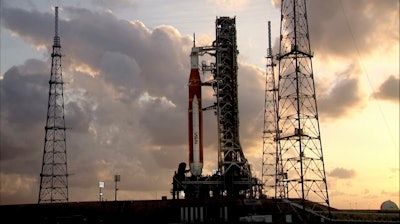 In this photo provided by NASA, NASA’s Space Launch System rocket and Orion crew capsule are seen on the launch pad at Launch Complex 39B at the Kennedy Space Center in Cape Canaveral, Fla., on Monday, June 20, 2022. NASA fueled the rocket for the first time on Monday and completed a countdown test despite a fuel line leak.