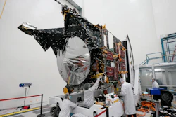 Technicians work on the Psyche spacecraft at the NASA Jet Propulsion Laboratory, April 11, 2022, in Pasadena, Calif. NASA put an asteroid mission on hold Friday, June 24, 2022, blaming the late delivery of its own navigation software. The Psyche mission to a strange metal asteroid of the same name was supposed to launch this September or October. But the agency’s Jet Propulsion Lab was several months late writing and delivering its software for navigation, guidance and control.