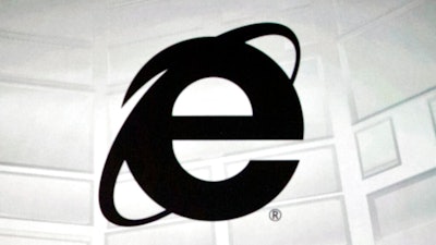 The Microsoft Internet Explorer logo is projected on a screen during a Microsoft Xbox E3 media briefing in Los Angeles, June 4, 2012. As of Wednesday, June 15, 2022, Microsoft will no longer support the once-dominant browser that legions of web surfers loved to hate and a few still claim to adore.