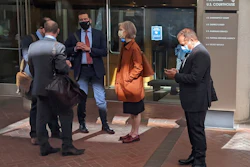 Former Theranos executive Ramesh 'Sunny' Balwani, right, stands near his legal team outside Robert F. Peckham U.S. Courthouse in San Jose, Calif., on March 1, 2022. A jury on Tuesday, June 21 is scheduled to hear closing arguments in the trial of Balwani, the former Theranos officer charged with teaming up with his secret lover, CEO Elizabeth Holmes, to carry out a massive fraud.
