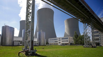 Smoke rises from cooling towers of the nuclear power plant Temelin near the town of Tyn nad Vltavou, Czech Republic, June 25, 2015. The Czech state-controlled power company CEZ said on Tuesday, June 28, 2022, Pennsylvania-based Westinghouse and Framatome will contribute to the country’s energy security by supplying the Temelin nuclear fuel for more than 10 years, starting in 2024.