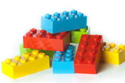 The design comprises alternating layers of sensing and processing elements.