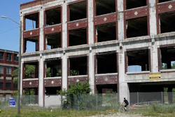 Exterior of the Packard Plant on Detroit's east side, Thursday, June 30, 2022. The factory built in the early 1900s turned out high-end cars into the 1950s. It was considered one of the city's automotive jewels, but now is among the nation's most notorious examples of urban blight. Parts of the 3.5 million-square-foot, 40-acre Packard plant complex will be demolished by the year's end.