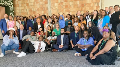 Graduates from the first cohort of the Detroit Apple Developer Academy pose for a photo following a ceremony held Thursday, June 30, 2022, in Detroit. The inaugural class of the Detroit Apple Developer Academy, a free program that teaches students the fundamentals of coding, design, marketing and project management, celebrated its unique accomplishment during a ceremony held Thursday.