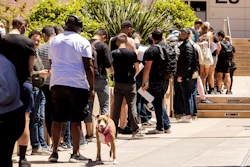 People stand in long lines to receive the monkeypox vaccine at San Francisco General Hospital in San Francisco, Tuesday, July 12, 2022.