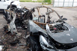 This image provided by the National Transportation Safety Board shows damage to a 2021 Tesla Model 3 Long Range Dual Motor electric car following a crash in September, 2021, in Coral Gables, Fla. A Florida jury on Tuesday, July 19, 2022, found electric car maker Tesla negligent for disabling a speed limiter on a vehicle but placed much of the blame for a fiery fatal crash on the 18-year-old driver. Barrett Riley and his friend Edgar Monserrat Martinez, both seniors at a private school in South florida, died in the May 2018 crash in Fort Lauderdale. A backseat passenger was ejected from the car and survived, officials said.