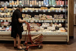 A man shops at a supermarket in New York, July 27, 2022.
