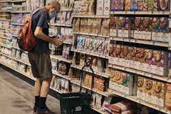 A man shops at a supermarket, July 27, 2022, New York.