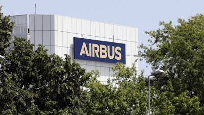 The logo of Airbus group is displayed in Toulouse, south of France, July 9, 2020. Airbus said net income plunged in the second quarter of 2022 and warned that supply chain challenges were leading it scale back production targets for its commercial aircraft.