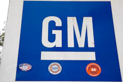A General Motors sign is seen at its facility in Langhorne, Pa., on Oct. 16, 2019. General Motors' second-quarter net income fell 40% from a year ago as computer chip and parts shortages hobbled factory output and drove the company's U.S. sales down more than 15%. The Detroit automaker said it made $1.67 billion from April, 2022, through June, 2022, in part because it couldn't deliver 95,000 vehicles during the quarter because they were built without one part or another.
