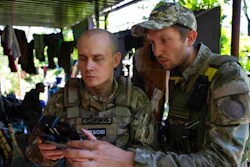 Ukrainian servicemen correcting artillery fire by drone at the frontline near Kharkiv, Ukraine, on Saturday, July 2, 2022. Never in the history of warfare have drones been used as intensively as in Ukraine, where they often play an outsized role in who lives and dies. Russians and Ukrainians alike depend heavily on unmanned aerial vehicles to pinpoint enemy positions and guide their hellish artillery strikes.