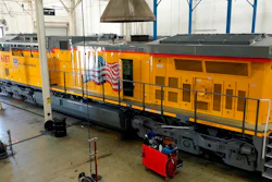 In this photo provided by Wabtec, a completed modernized Union Pacific locomotive is prepped for delivery at Wabtec's Fort Worth plant in Fort Worth, Texas, in October 2021. Union Pacific will spend more than $1 billion to upgrade 600 of its old diesel locomotives over the next three years and make them more efficient, but regulators still want it to do more to cut pollution from its engines.