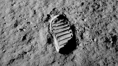 A layer of fine dust and sharp rock shards covers the surface of the Moon, as shown in this photo taken by Buzz Aldrin in 1969.
