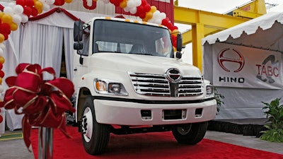 The first Hino truck assembled in North America is unveiled Tuesday, Oct. 19, 2004, at the Toyota's longest operating U.S. manufacturing facility, TABC, Inc. in Long Beach, Calif. Hino Motors, a truck maker that’s part of the Toyota group, systematically falsified emissions data, dating back as far back as 2003, according to a special investigation disclosed Tuesday, Aug. 2, 2022.
