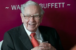 Warren Buffett, chairman and CEO of Berkshire Hathaway, smiles as he plays bridge following the annual Berkshire Hathaway shareholders meeting in Omaha, Neb., on May 5, 2019.
