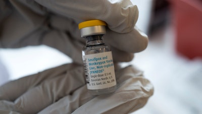 Registered pharmacist Sapana Patel holds a bottle of Monkeypox vaccine at a Pop-Up Monkeypox vaccination site on Wednesday, Aug. 3, 2022, in West Hollywood, Calif.