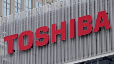 The logo of Toshiba Corp. is seen at a company's building in Kawasaki near Tokyo, on Feb. 19, 2022. Toshiba reported Wednesday, Aug. 8, 2022, a 44% improvement in profit for the first fiscal quarter as the Japanese technology giant sought to revamp its brand image and reassure investors about its management.