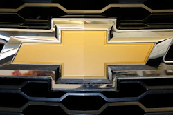 The Chevrolet logo is displayed at the 2020 Pittsburgh International Auto Show Thursday, Feb.13, 2020 in Pittsburgh. General Motors is recalling more than 484,000 large SUVs in the U.S., Tuesday, Aug. 16, 2022, to fix a problem that can cause the third-row seat belts to malfunction. The recall covers Chevrolet Suburbans and Tahoes, Cadillac Escalades and GMC Yukons from 2021 and 2022.