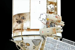 In this photo taken from video footage released by Roscosmos Space Agency, Roscosmos' cosmonauts Oleg Artemyev and Denis Matveev are seen during their spacewalk on the International Space Station (ISS), Wednesday, Aug. 17, 2022.