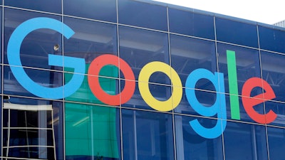 A sign is shown on a Google building at their campus in Mountain View, Calif., on Sept. 24, 2019. Hundreds of Google employees are petitioning the company to extend its abortion healthcare benefits to contract workers and to strengthen privacy protections for Google users searching for abortion information online.