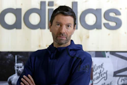 CEO of German sports equipment company adidas AG, Kasper Rorsted, poses prior to the annual balance news conference in Herzogenaurach, Germany, Wednesday, March 14, 2018. Sports apparel maker Adidas said Monday that Kasper Rorsted, its CEO since 2016, will step down next year and it has started looking for a successor.