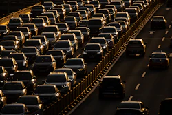 Rush hour traffic backs up along a highway in Beijing, China, on April 23, 2020. Hainan island in the South China Sea said Monday, Aug. 22, 2022 that it will become China's first region to ban sales of gasoline- and diesel-powered cars to curb climate-changing carbon emissions.
