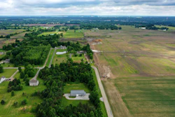 This aerial image taken with a drone on June 9, 2022 shows a portion of land in Johnstown, Ohio, where Intel plans to build two new processor factories. The houses on the left are up for demolition. Intel Corp. plans a Sept. 9 groundbreaking for its planned $20 billion Ohio semiconductor operations with President Joe Biden giving remarks, the company and the the White House said Thursday, Aug. 25, 2022.
