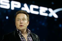 In this May 29, 2014, file photo, Elon Musk, CEO and CTO of SpaceX, introduces the SpaceX Dragon V2 spaceship at the SpaceX headquarters in Hawthorne, Calif.