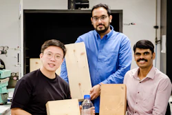 (from right) NTU Assoc Prof Aravind Dasari, NTU PhD graduate Dr Sheik Anees and PhD student Dean Seah. Assoc Prof Aravind is holding a coated piece of laminated timber while Dr Anees and Mr Seah are holding non-coated timber.