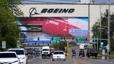Nearly 2,500 workers at three Boeing defense plants in the Midwest voted Wednesday, Aug. 3, 2022, to ratify a contract that their union said will raise pay by an average of 14% over three years and add inflation adjustments.