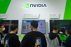 Visitors stop by the booth of Nvidia at the Apsara Conference, an annual cloud service technology forum hosted by Alibaba Group, in Hangzhou in eastern China's Zhejiang province Tuesday, Oct. 19, 2021.