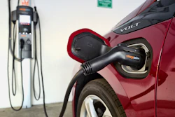 A Chevrolet Volt hybrid car is seen charging at a ChargePoint charging station at a parking garage in Los Angeles, Oct. 17, 2018.