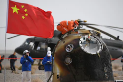 In this photo released by China's Xinhua News Agency, the return capsule of the Shenzhou-13 manned space mission is seen after landing at the Dongfeng landing site in northern China's Inner Mongolia Autonomous Region, April 16, 2022.