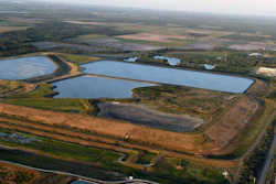 This aerial photo taken from an airplane shows a reservoir near the old Piney Point phosphate mine on April 3, 2021, in Bradenton, Fla.