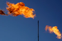 Flares burn off methane and other hydrocarbons at an oil and gas facility in Lenorah, Texas, Friday, Oct. 15, 2021.