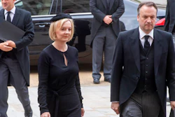 British Prime Minister Liz Truss and her husband Hugh O'Leary arrive for the funeral service of Queen Elizabeth II at Westminster Abbey in central London, Monday Sept. 19, 2022. The Queen, who died aged 96 on Sept. 8, will be buried at Windsor alongside her late husband, Prince Philip, who died last year.