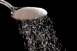 Granulated sugar is poured in Philadelphia, Sept. 12, 2016. A federal judge has rejected the Justice Department's bid to block a major U.S. sugar manufacturer from acquiring its rival, clearing the way for the acquisition to proceed. The ruling, handed down Friday, Sept. 23, 2022, by a federal judge in Wilmington, Del., comes months after the Justice Department sued to try to halt the deal between U.S. Sugar and Imperial Sugar Company, one of the largest sugar refiners in the nation.