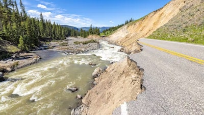 Fast-moving floodwater obliterated sections of major roads through Yellowstone National Park in June 2022.