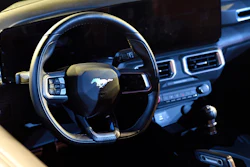 A parts shortage that has thousands of Ford's most-profitable vehicles sitting on lots waiting to be fully assembled has forced the automaker to slash its third-quarter earnings forecast, according to Ford Monday, Sept. 19.