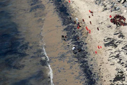 A judge has approved a $230 million lawsuit settlement by the owners of a pipeline that spilled more than 140,000 gallons of crude oil into the ocean off California in 2015.