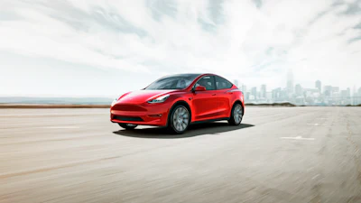 This photo provided by Tesla shows the 2022 Tesla Model Y, an all-electric SUV that has an EPA-estimated maximum range of about 330 miles.