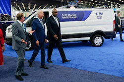 President Joe Biden listens during a tour at the Detroit Auto Show, Sept. 14, 2022, in Detroit. From left, Rep. Debbie Dingell, D-Mich., Michigan Gov. Gretchen Whitmer, Bill Ford, executive chairman of Ford Motor Company, Biden and Ray Curry, President of the United Auto Workers.