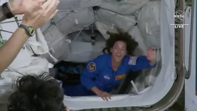 In this image from video made available by NASA, U.S. Marine Col. Nicole Mann, a member of the Wailacki of the Round Valley Indian Tribes in California, enters the International Space Station from a SpaceX Crew Dragon capsule on Thursday, Oct. 6, 2022. Her crew of four includes the first Russian to launch from the U.S., in 20 years and the first Native American woman to orbit the Earth.